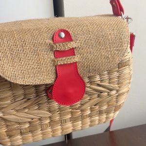 Straw and red leather bag